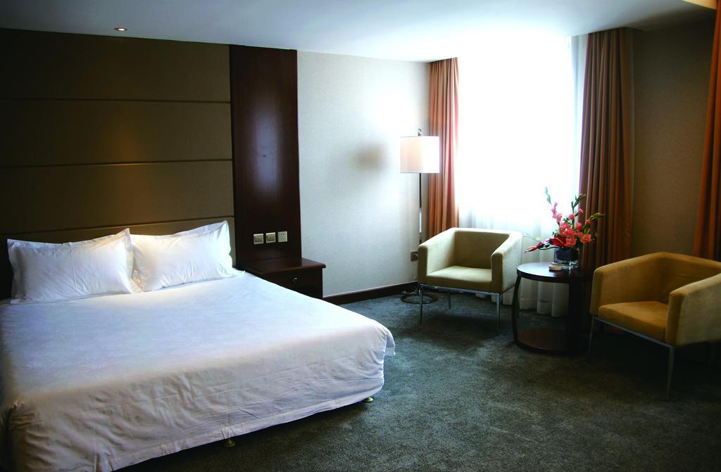 New Gloria Plaza Garden Hotel Харбін Екстер'єр фото