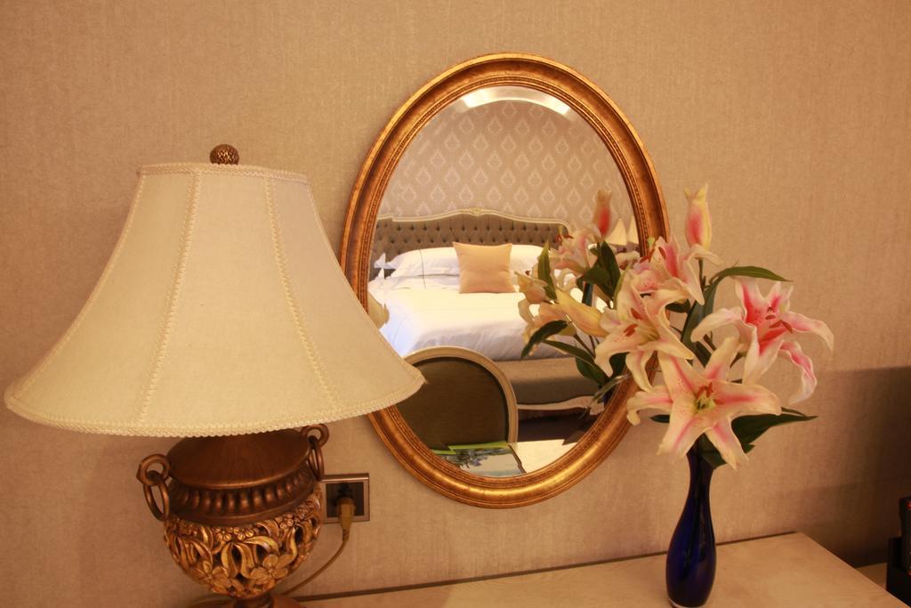 New Gloria Plaza Garden Hotel Харбін Номер фото