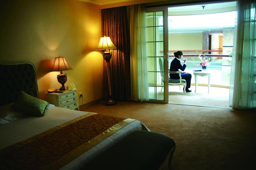 New Gloria Plaza Garden Hotel Харбін Номер фото