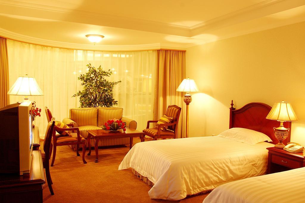 New Gloria Plaza Garden Hotel Харбін Номер фото