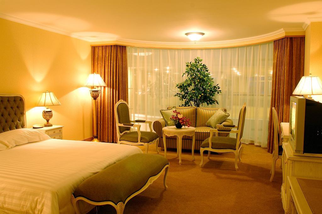 New Gloria Plaza Garden Hotel Харбін Номер фото