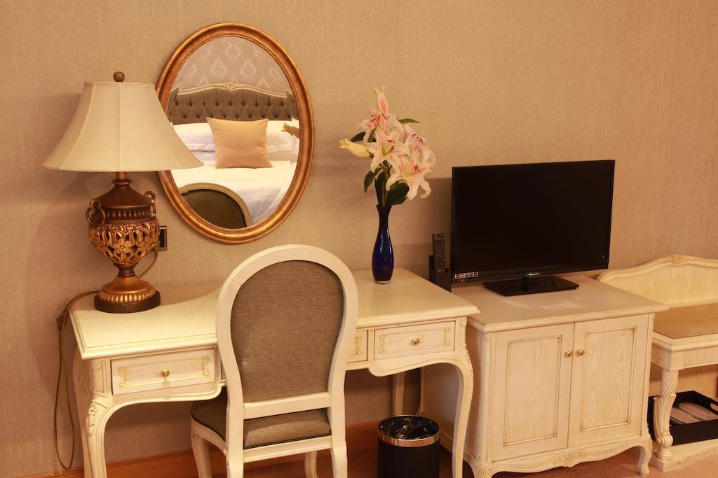 New Gloria Plaza Garden Hotel Харбін Номер фото