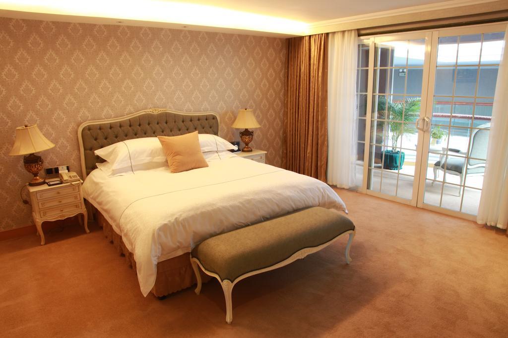 New Gloria Plaza Garden Hotel Харбін Номер фото