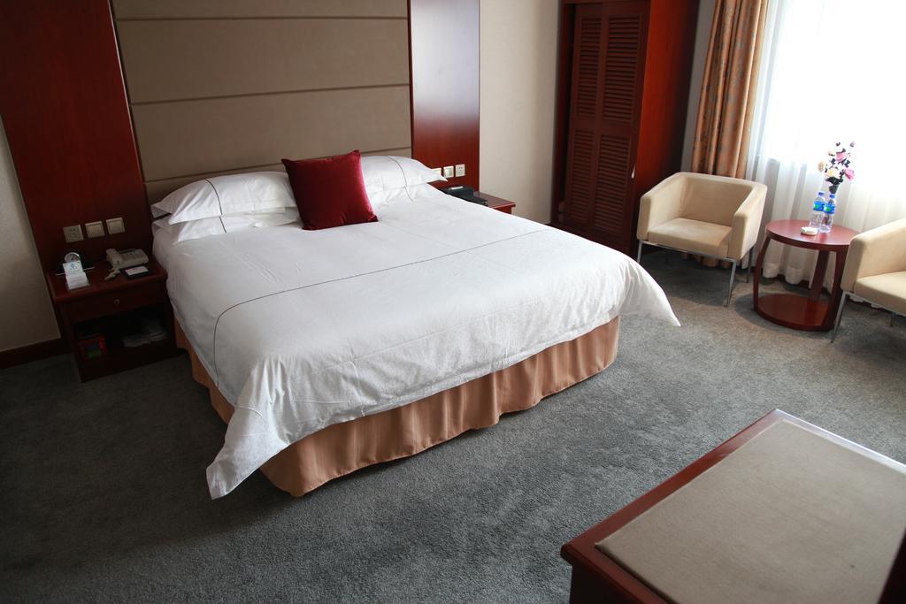 New Gloria Plaza Garden Hotel Харбін Номер фото