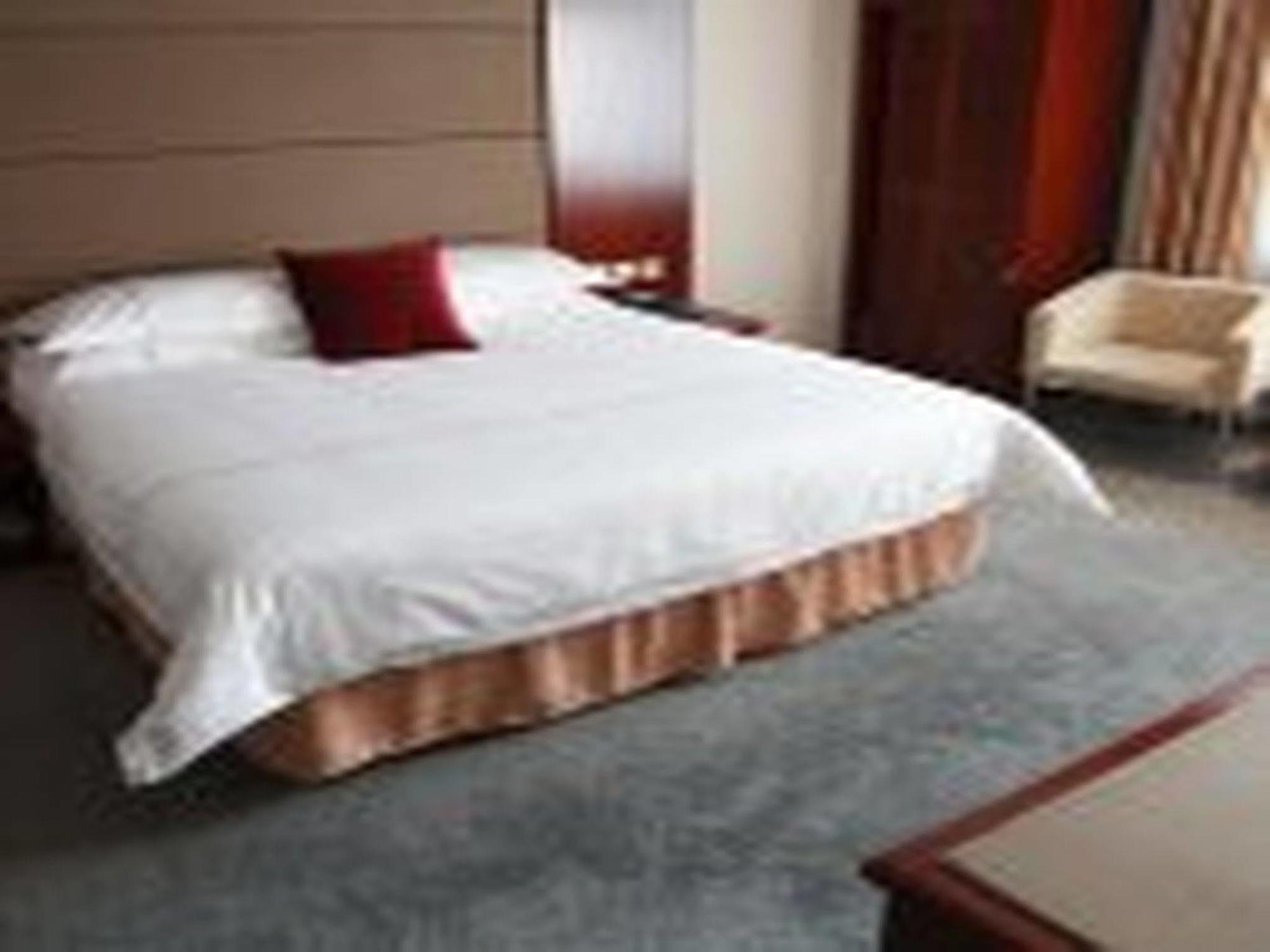 New Gloria Plaza Garden Hotel Харбін Екстер'єр фото